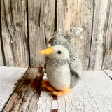 Penguin with silver antlers