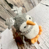 Penguin with silver antlers