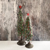 Two Metal Holly Trees