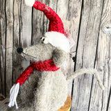 Sitting Mouse with a red hat and scarf