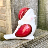 Red and White Ceramic Bird