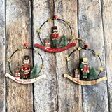 Three toy solders tree decorations